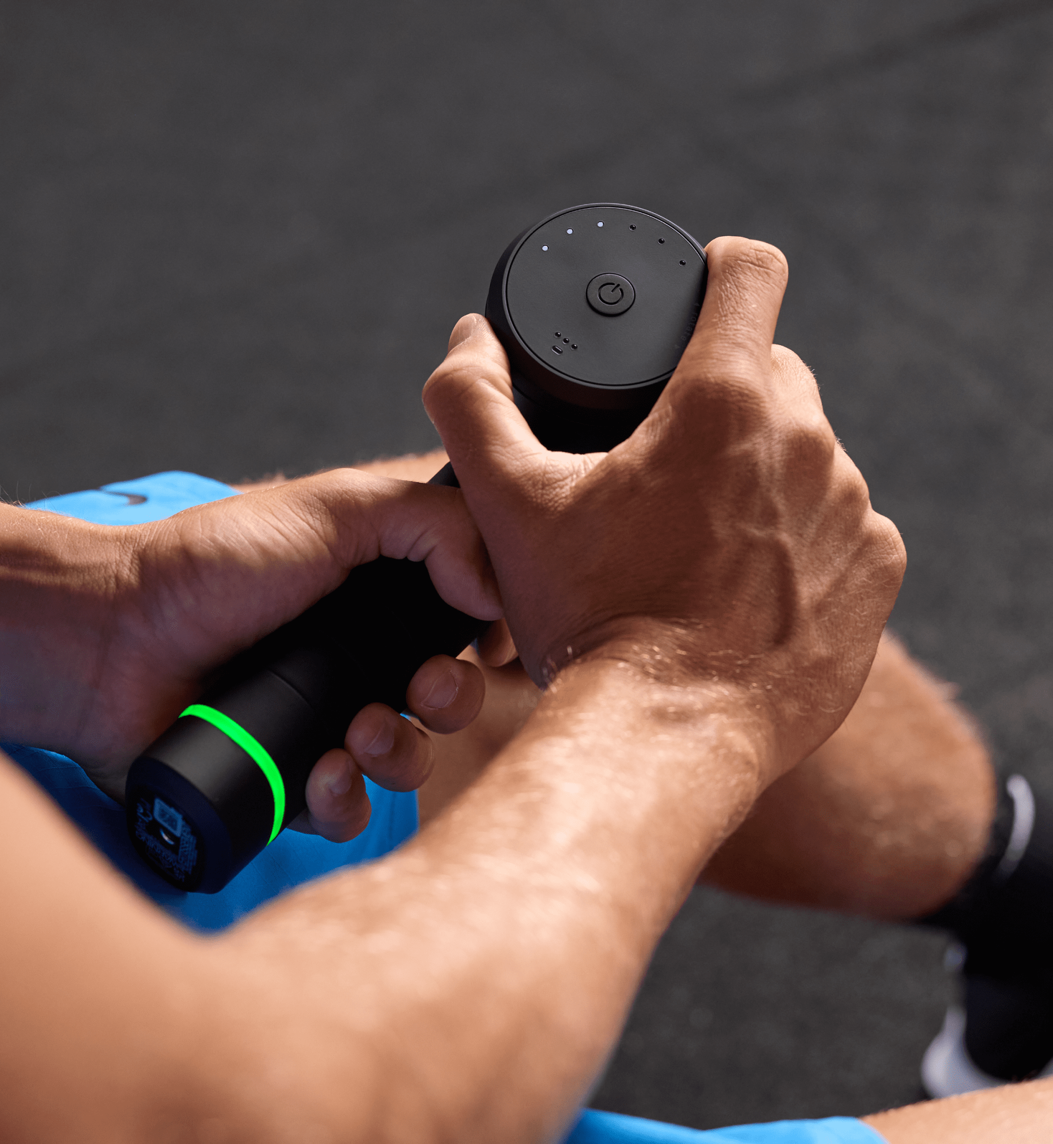 Person adjusting the speed dial on their Hypervolt 3 Pro