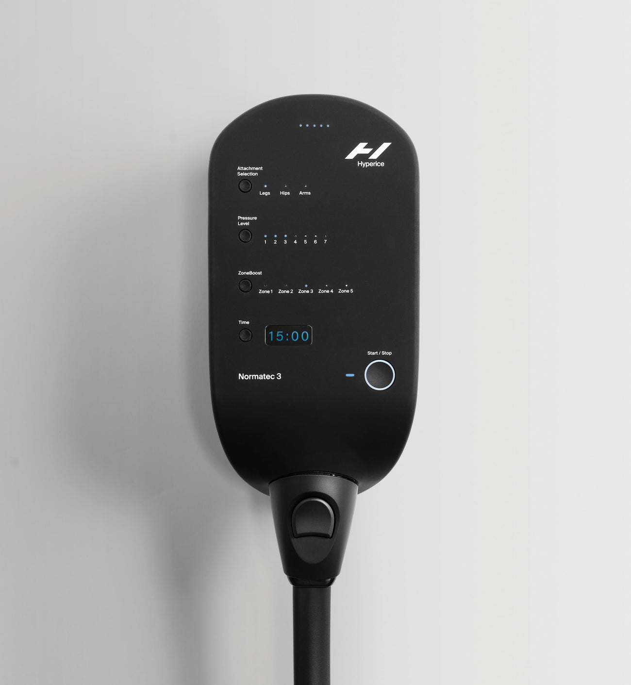 close up shot of the front of the control unit of the normatec 3 on a gray background