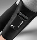 Black Normatec Go compression device on a person's calves.